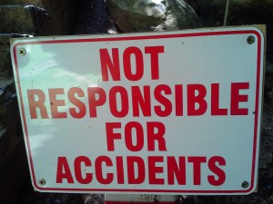 Sign that reads, "Not Responsible for Accidents"