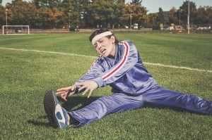 Woman in track suit stretching Image by RyanMcGuire on Pixabay (https://pixabay.com/en/stretching-sports-woman-athlete-498256/) 