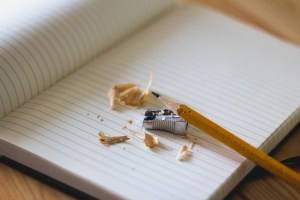 Journal, pencil, and pencil sharpener by Unsplash on Pixabay at https://pixabay.com/en/pencil-sharpener-notebook-paper-918449/